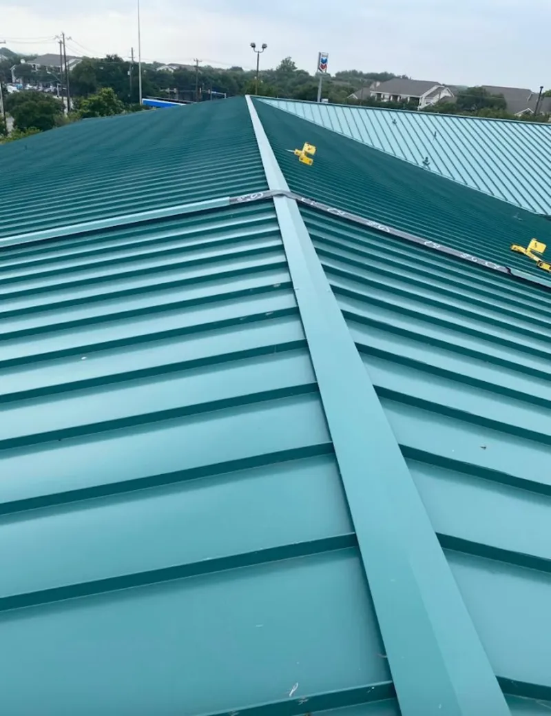 Green commercial metal roof ridge and valley for Metal Roof Repair in Sheffield Lake
